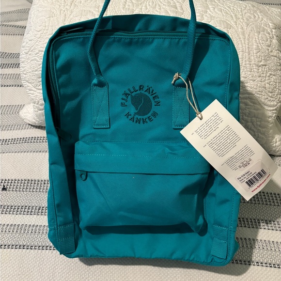 Fjallraven Handbags - Fjallraven Kanken Backpack color Emerald Blue NWT